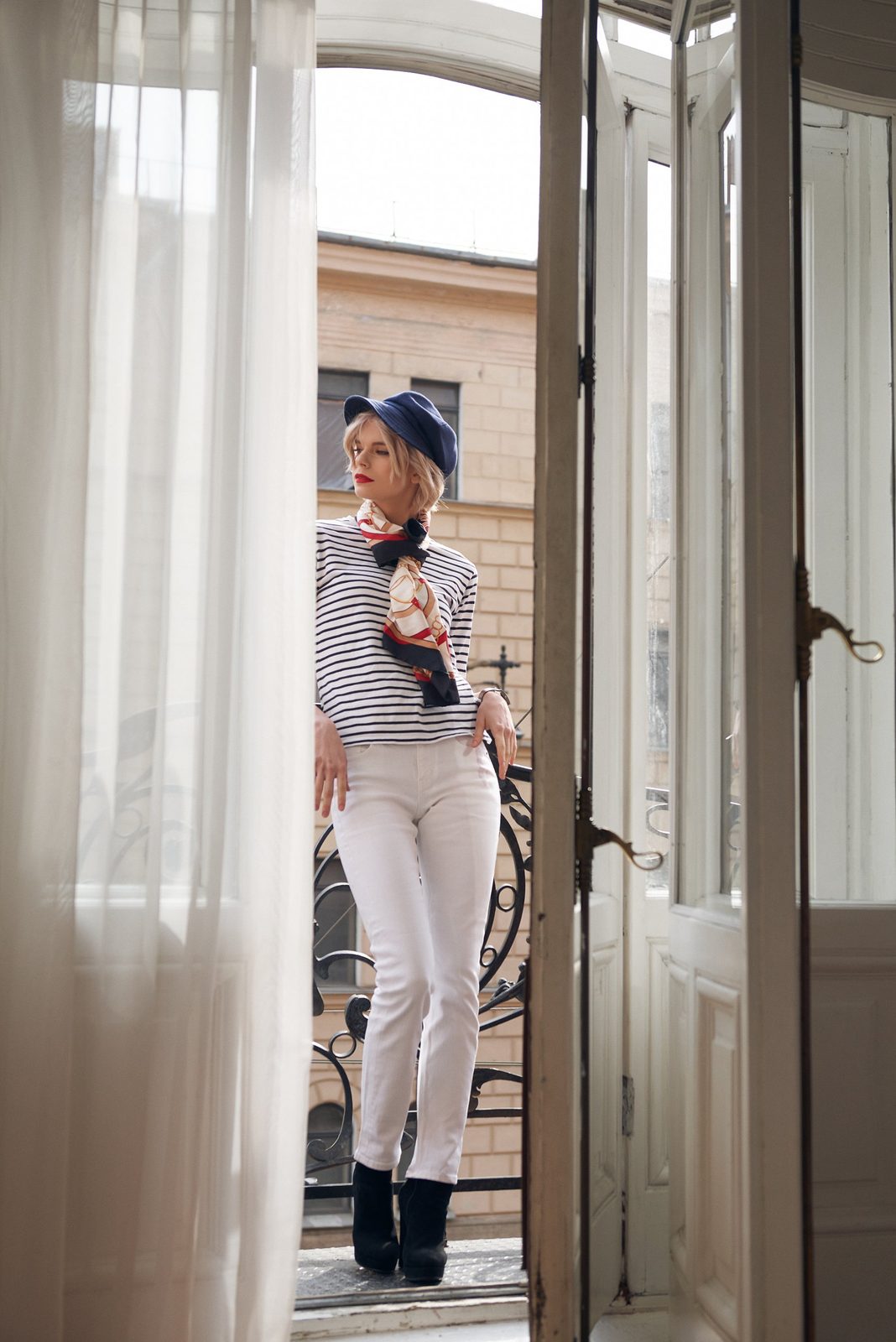Breton stripes, silk scarf and red lip on a balcony