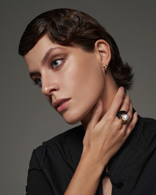 Beauty portrait, sculpted brows and glowing skin
