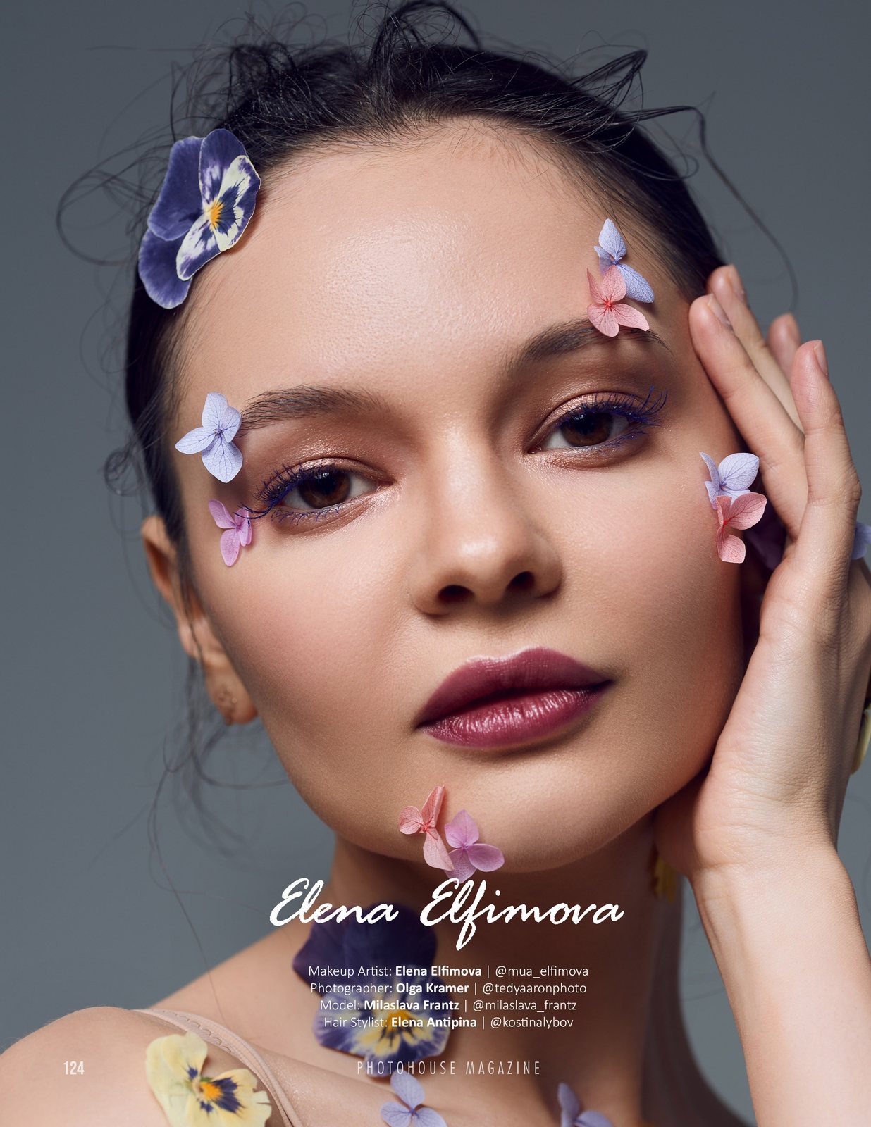 Beauty portrait with petals on the skin