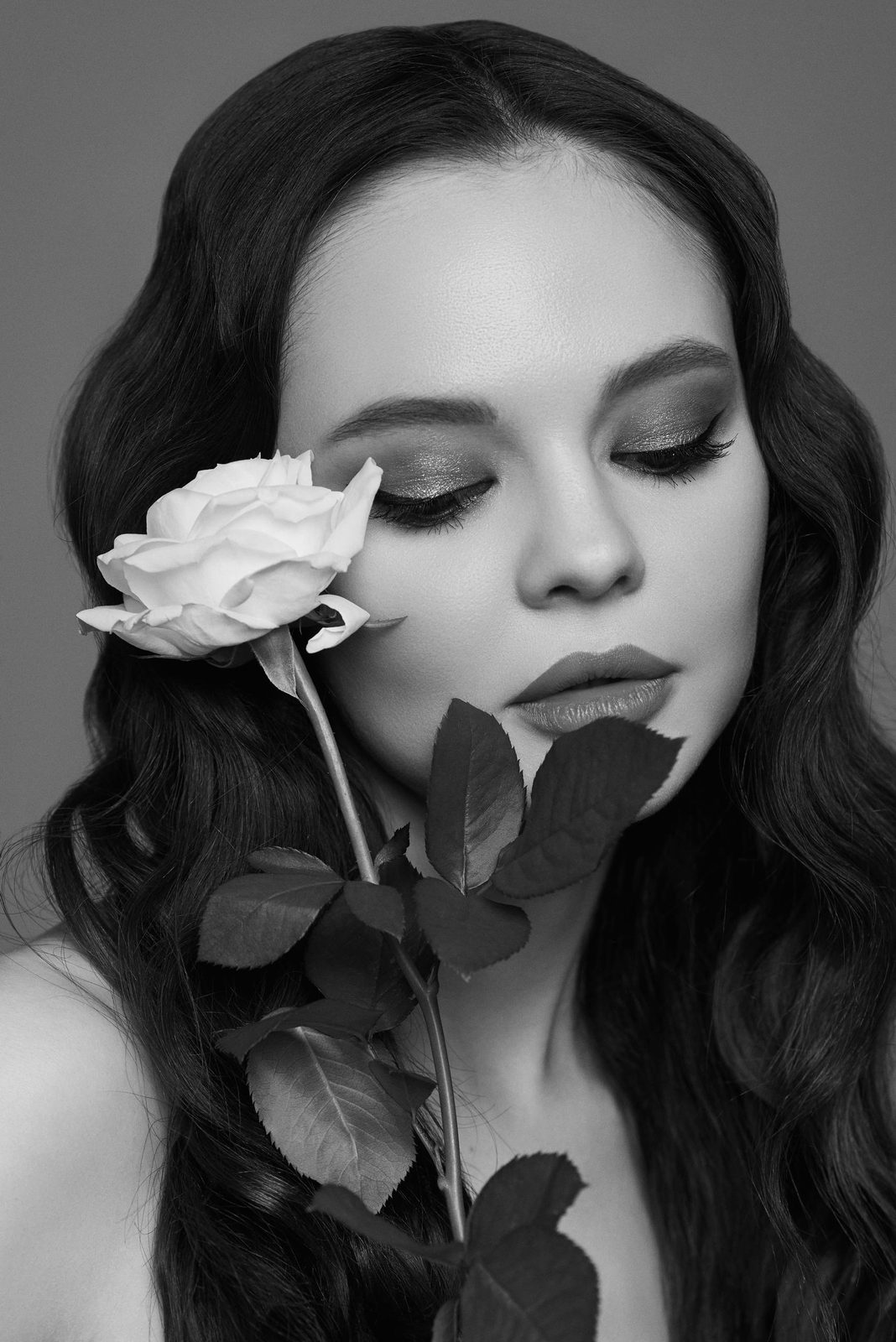 Black and white beauty portrait with a white rose, Photohouse Magazine